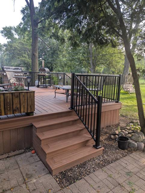 Trex Tiki Torch deck in Livonia, MI built by Supreme Deck
