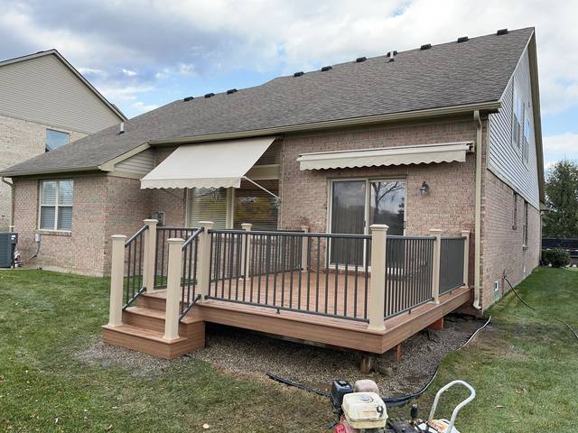 Trex Tiki Torch deck in Livonia, MI built by Supreme Deck